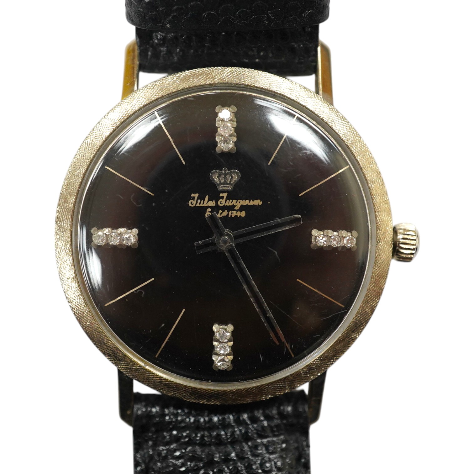 A gentleman's 14kt white metal Jules Jurgensen manual wind wrist watch, with diamond quarterly markers, cased diameter 34mm, on an associated leather strap. Condition - fair to good